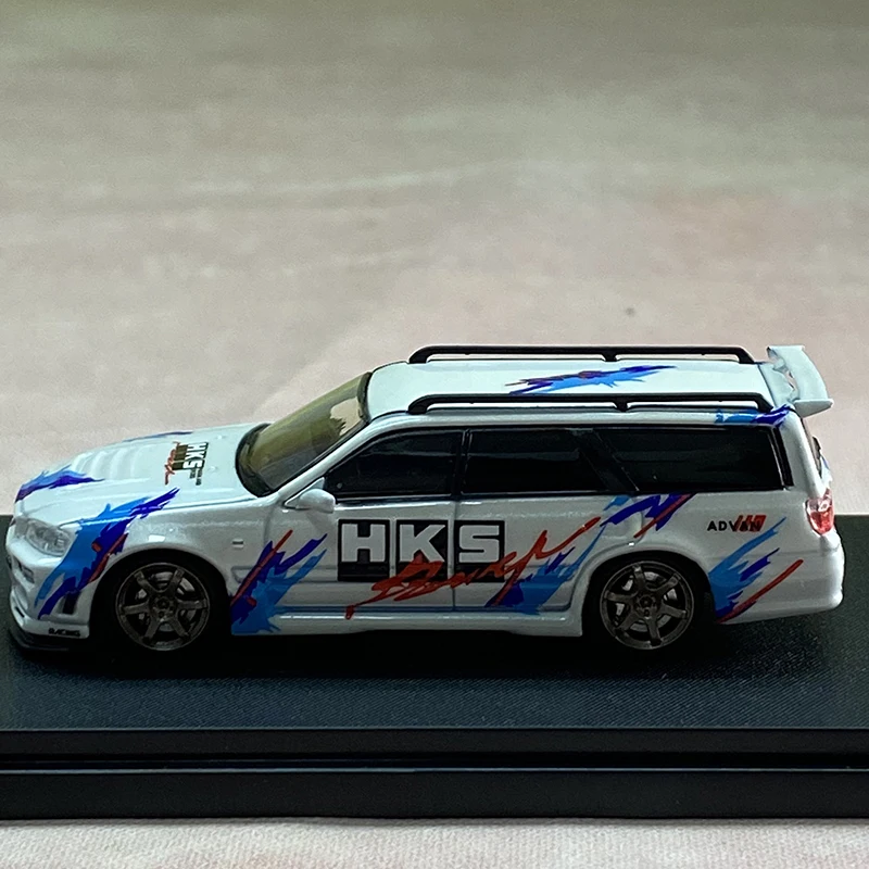 SW دييكاست 1/64 مقياس نيسان ستاجيا R34 GT-R عربة نموذج سيارة سبيكة نيسان ستاجيا R34 GT-R نموذج سيارة هدية مجموعة حلية