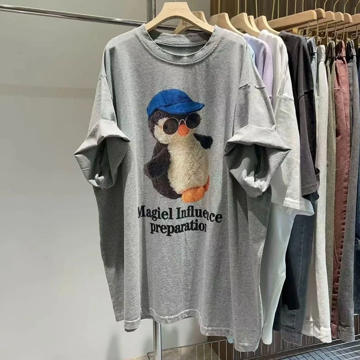 

Супер милые футболки с короткими рукавами из чистого хлопка с изображением маленького пингвина в Корейском стиле для мужчин и женщин на улице