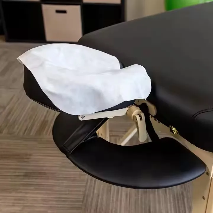 200 قطعة من أغطية المهد للوجه للاستعمال مرة واحدة - أغطية وجه للتدليك فائقة النعومة وغير لاصقة/أغطية مسند الرأس لطاولات وكراسي التدليك