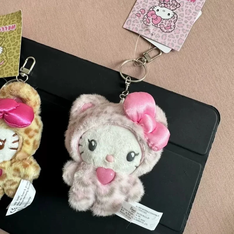 Simpatico caffè latte stampa leopardata Kt gatto peluche fiocco bambola ciondolo zaino carino peluche portachiavi ciondolo regalo di compleanno per ragazze