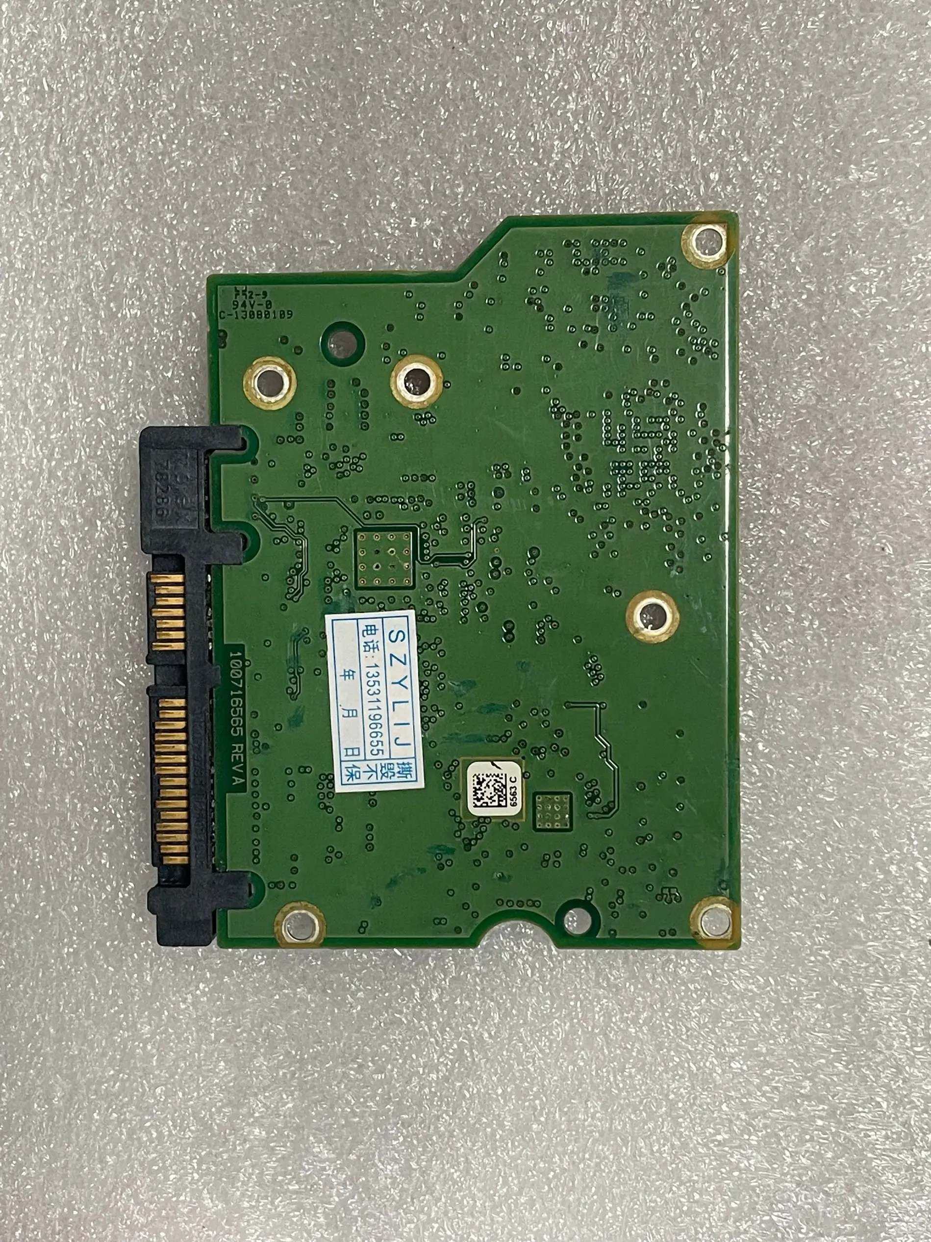 100716565 rev a Hard disk circuit board 100716565 rev A