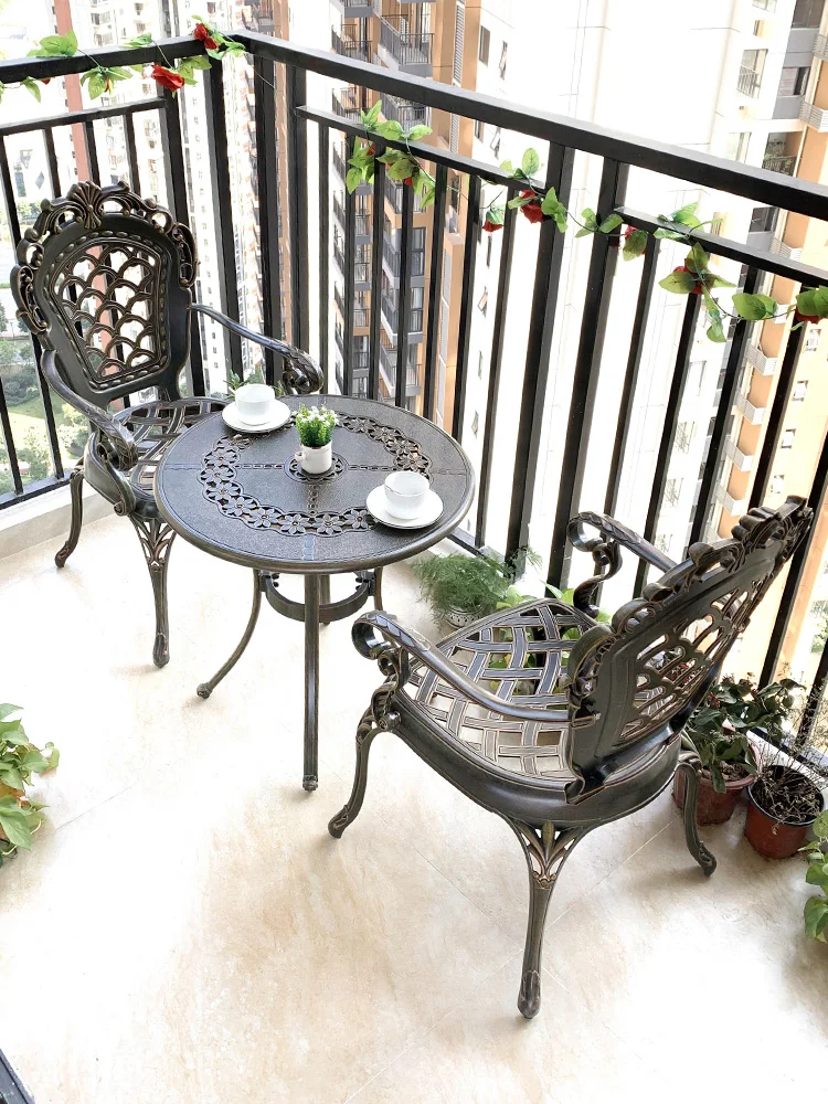 

Three piece set of combination iron art outdoor tables and chairs, courtyard garden outdoor leisure furniture