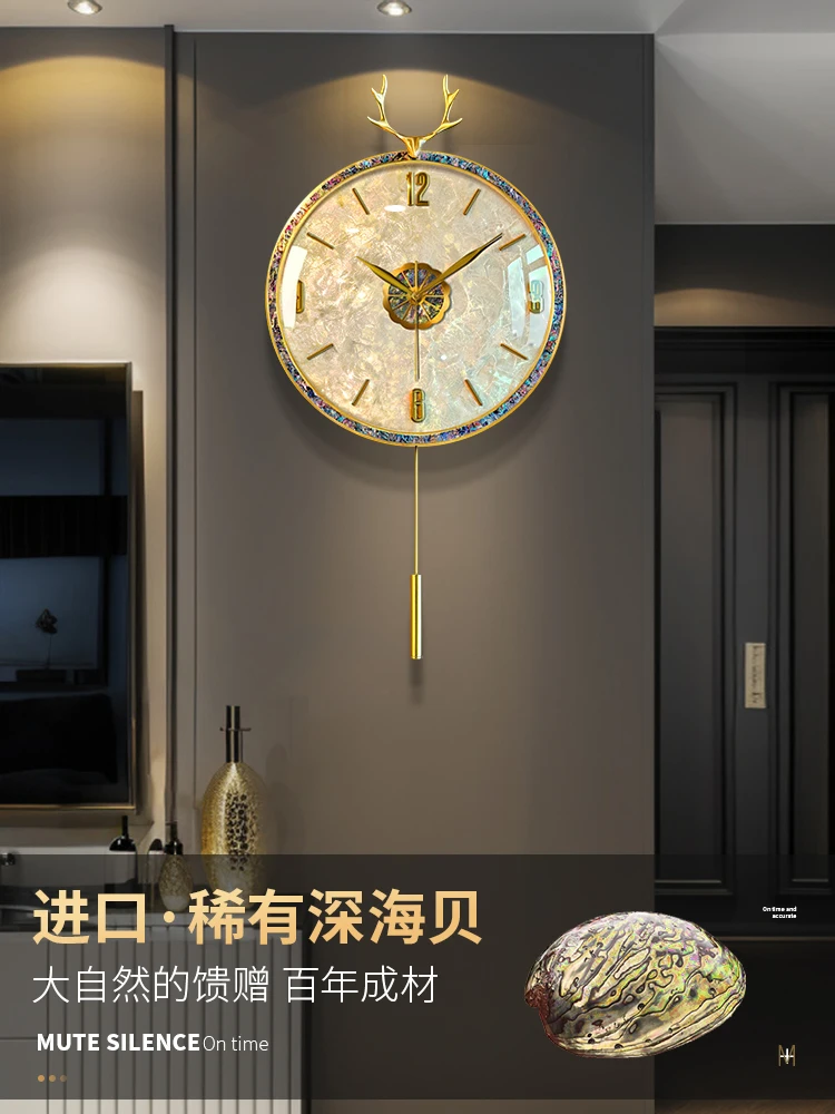 Modern light luxury shell wall clock atmosphere living room high sense wall hanging home art wall watch