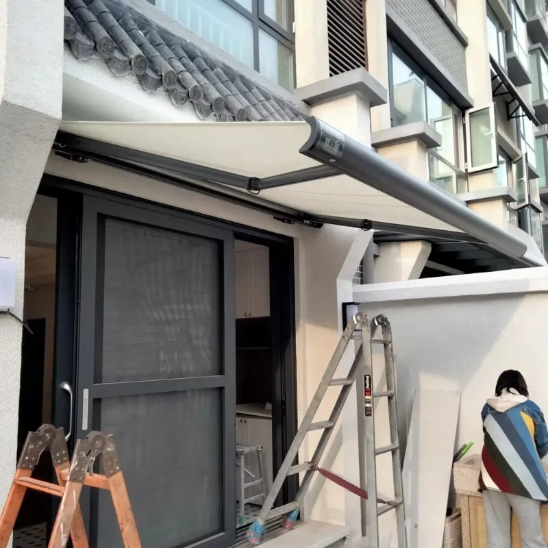 

Изготовленная на заказ акриловая водонепроницаемая ткань, моторизованный алюминиевый тент с полной кассетой, непромокаемый солнцезащитный козырек для улицы с испанским/китайским языком