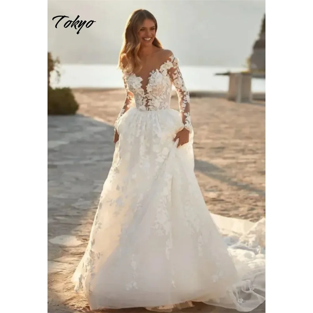 Tokyo op maat gemaakte witte a-lijn trouwjurk off-shoulder kant lange mouwen rugloze bruidsjurk rechter trein trouwjurk