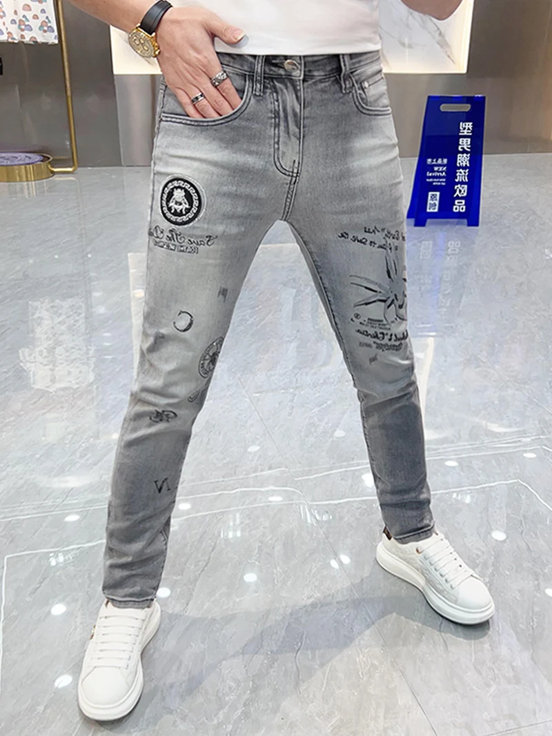 

Light ey Men's Jeans Spring Summer Faion Slim Fit Long Pants Embroidered Print Brand Bae Waed out High Waist Zipper