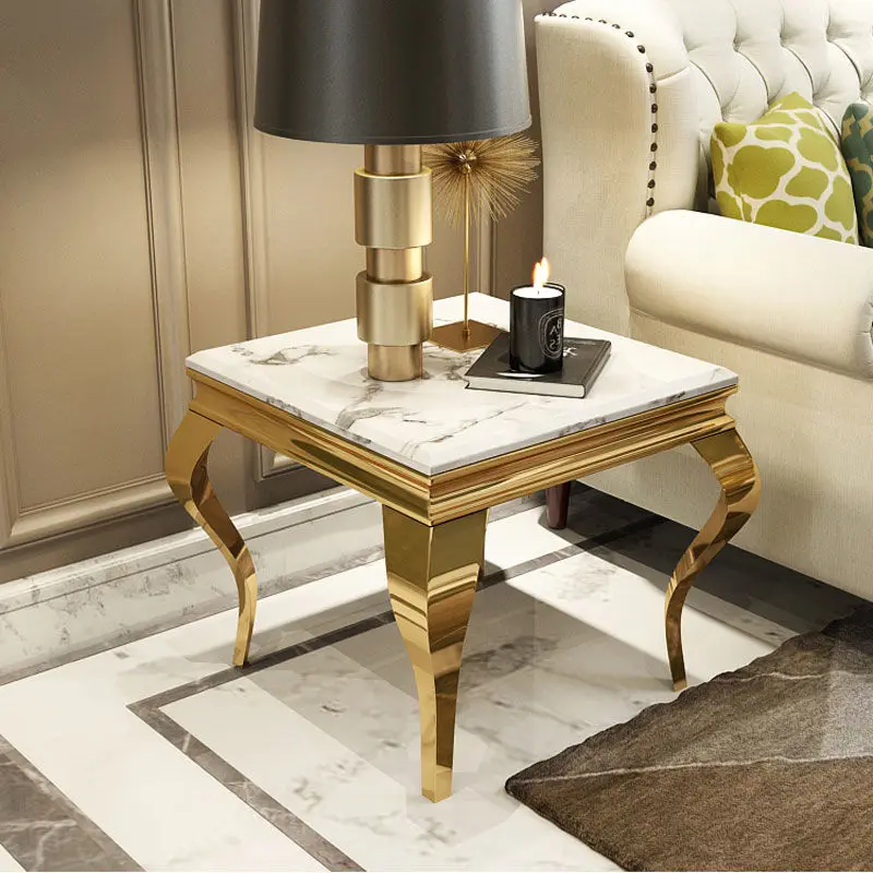 A few small coffee tables with luxurious gold edges. Marble tempered glass cube A few high-grade square corners beside the sofa