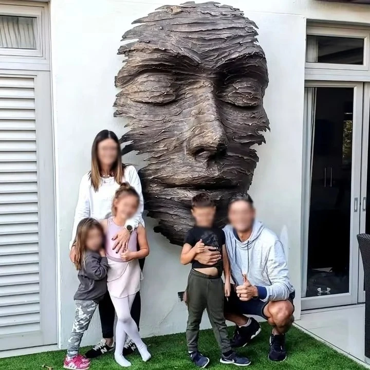 Outdoor abstract metal bronze face statue