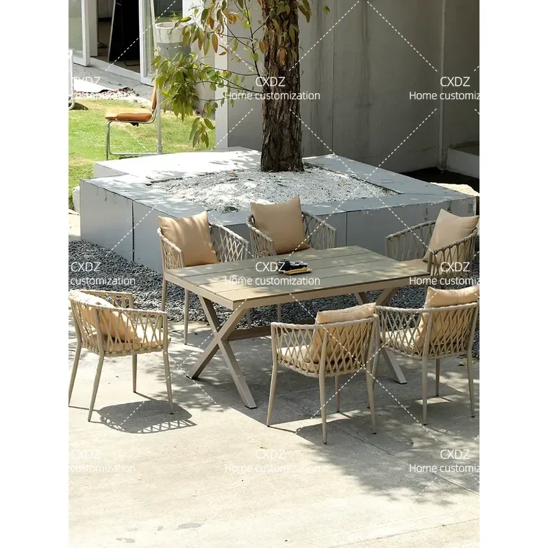 Outdoor Plastic Wood Table and Chair Set Waterproof Sunproof Nordic Rattan Style Leisure Furniture for Villa Garden Courtyard