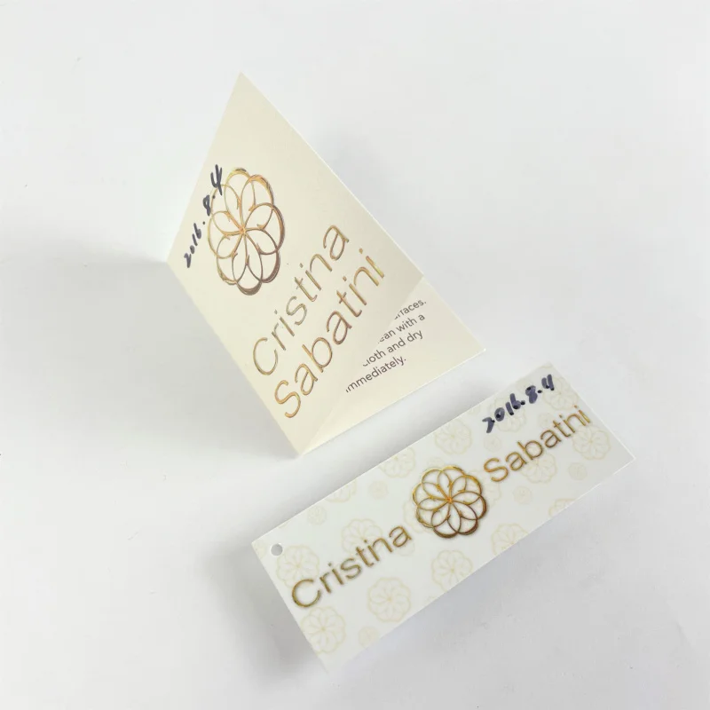 

50 0.Zhang.Custom.Custom foldable pearlescent paper hang tags clothing and products with elegant