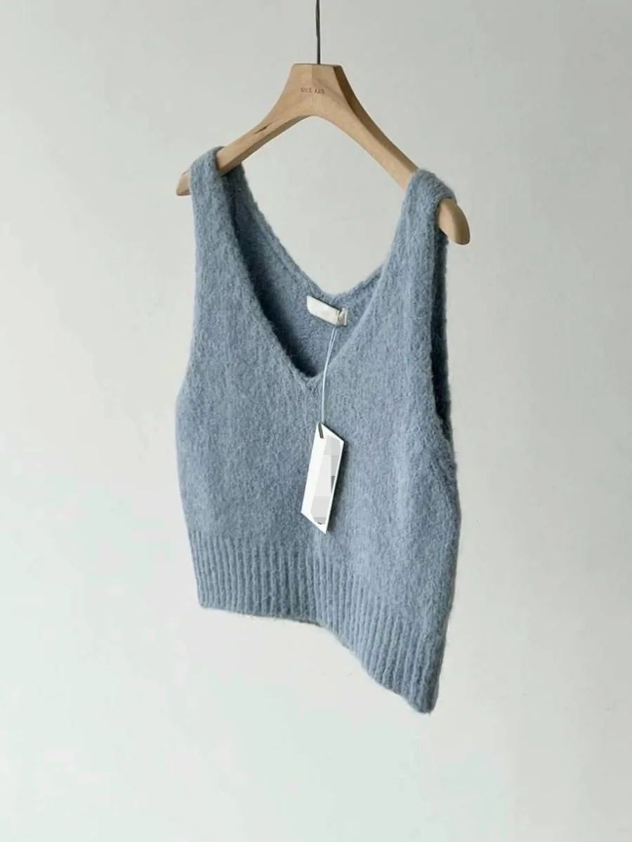 

Spring 2025 Dongdaemun V-ne Svel Knitted Vest Women's Pure Color oulder Strap Top Commute Sle ort Length