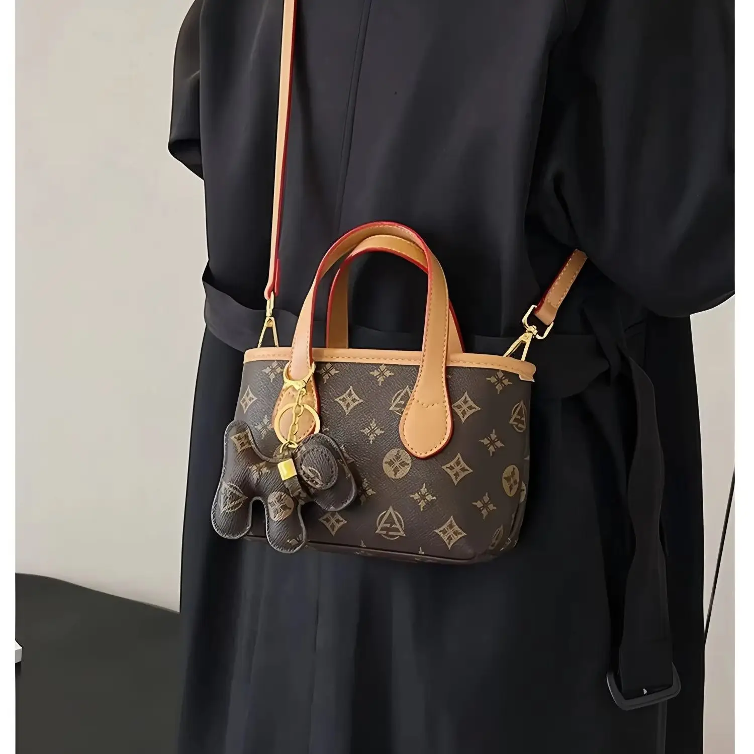 Brown leather trim, double top handles, cute dog charm, detachable thin shoulder strap, versatile women's shoulder bag.