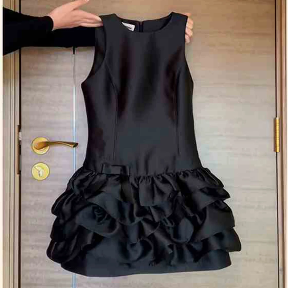 

French holiday temperament socialite short skirt black acetic acid satin ruffle edge splicing vest dress spring 2025