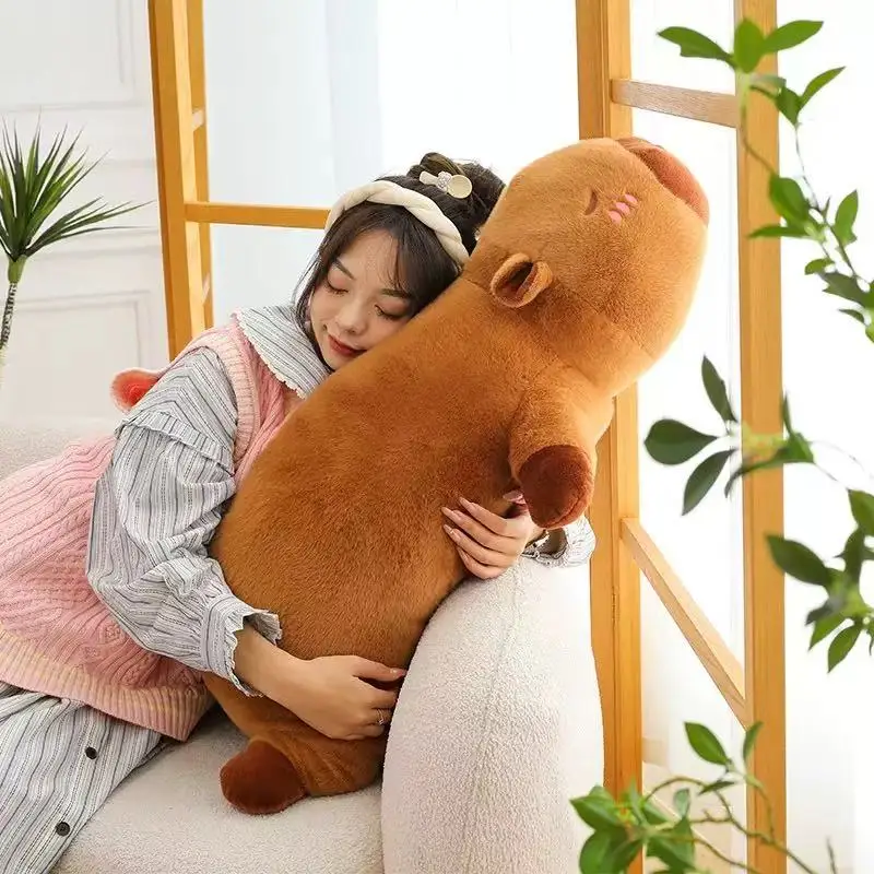 60cm Kawaii dibujos animados tira gigante Capybara muñeco de peluche almohada tumbada marrón naranja alas creativo Capybara peluche juguete decoración del hogar