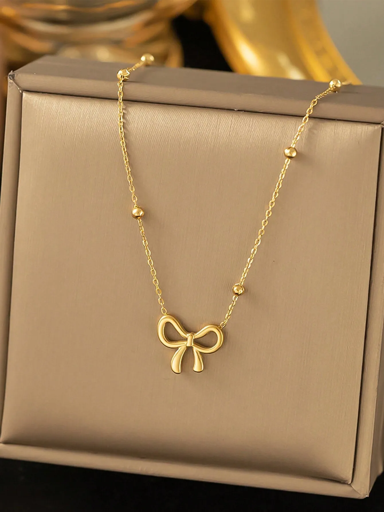 

Gold Bow Pendant Necklace with Beaded Chain, Elegant Women's Daily Jewelry Accessory