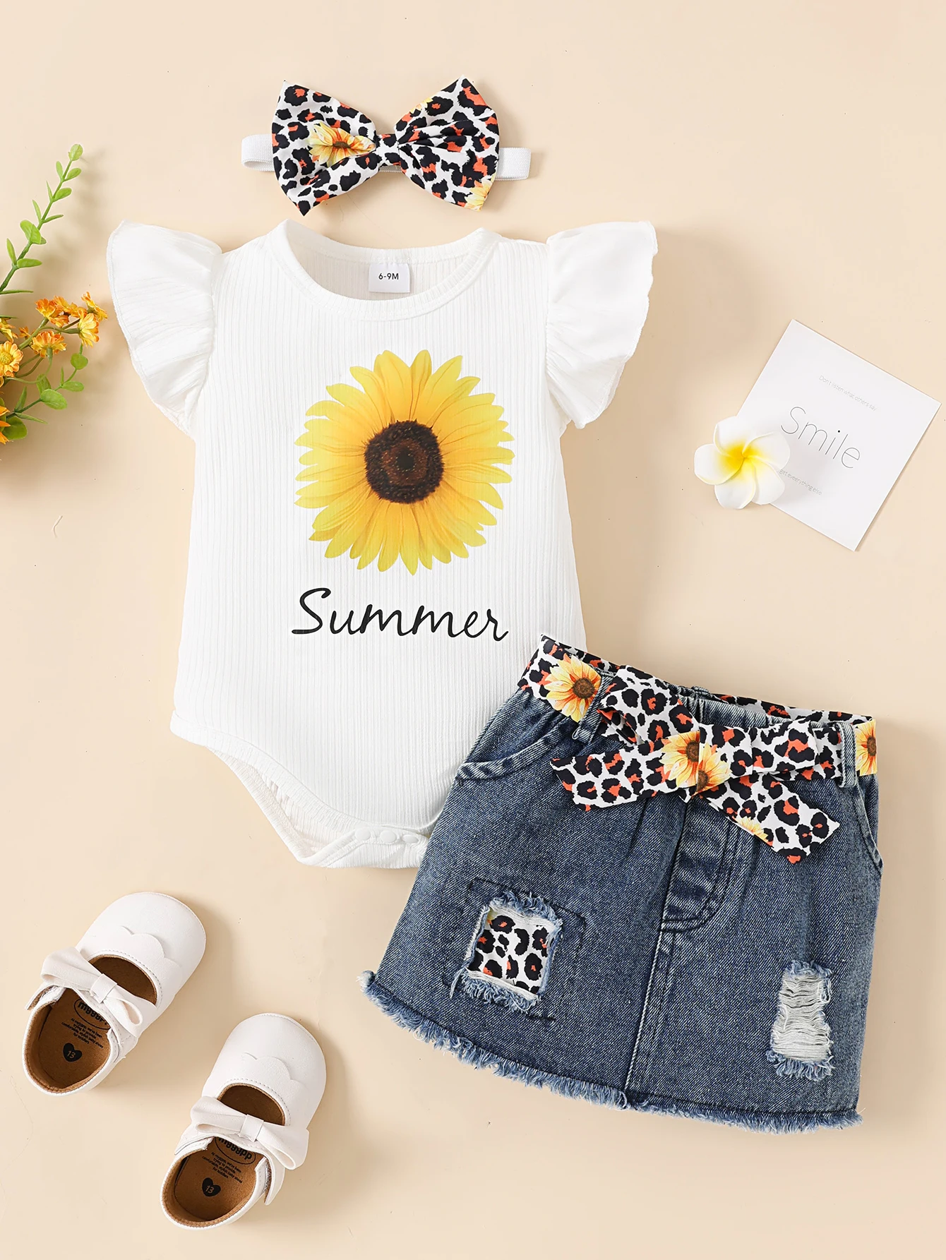 

Playful Summer Look: White T - shirt with Sunflower Print, Paired with Distressed Denim Skirt, Leopard - print Details Add Trend