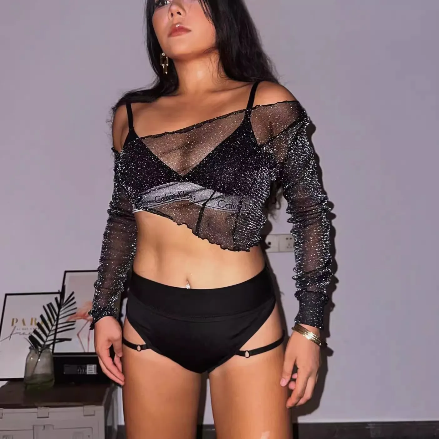 

Solid color shiny hollow mesh slanted shoulder irregular collar sexy exposed navel top mesh see through long sleeved top