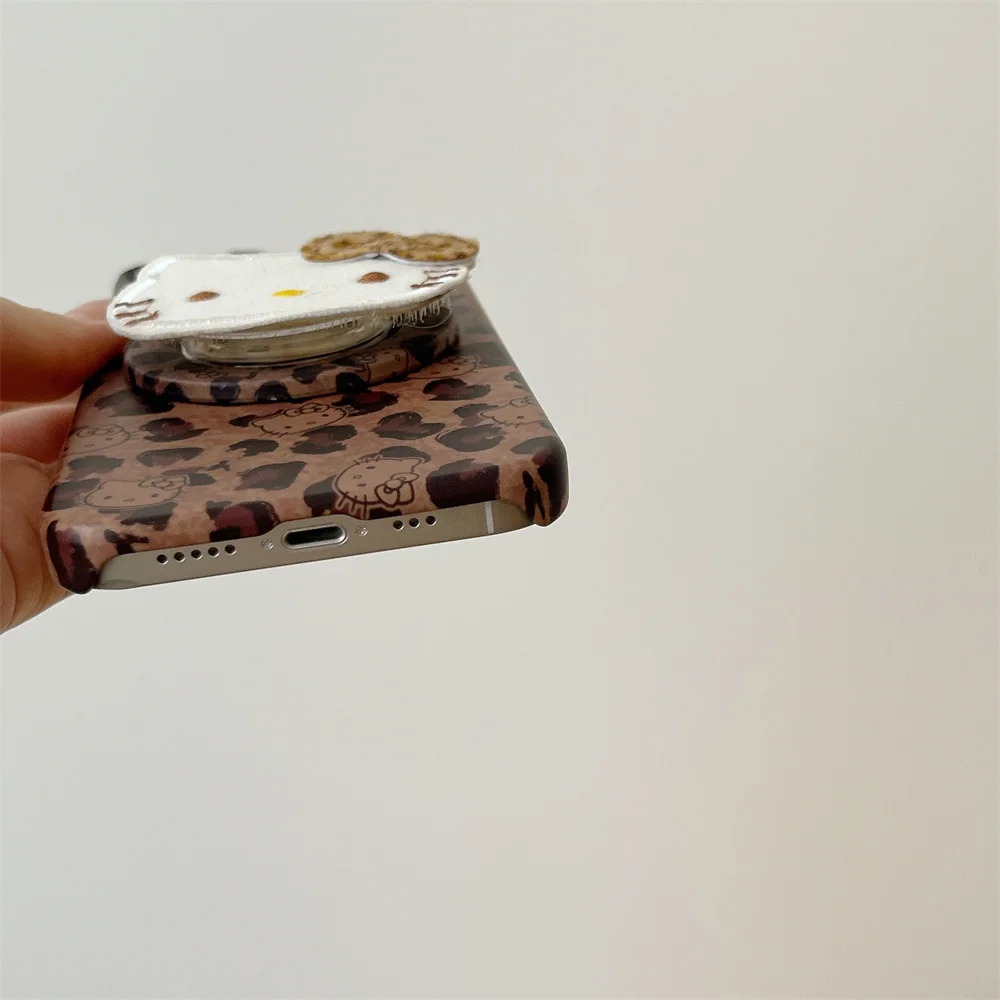 Nuevo cordón de lujo con soporte HelloKitty con estampado de leopardo, adecuado para iPhone 17 12, 13, 14, 15, 16 Pro Max anticaída todo incluido