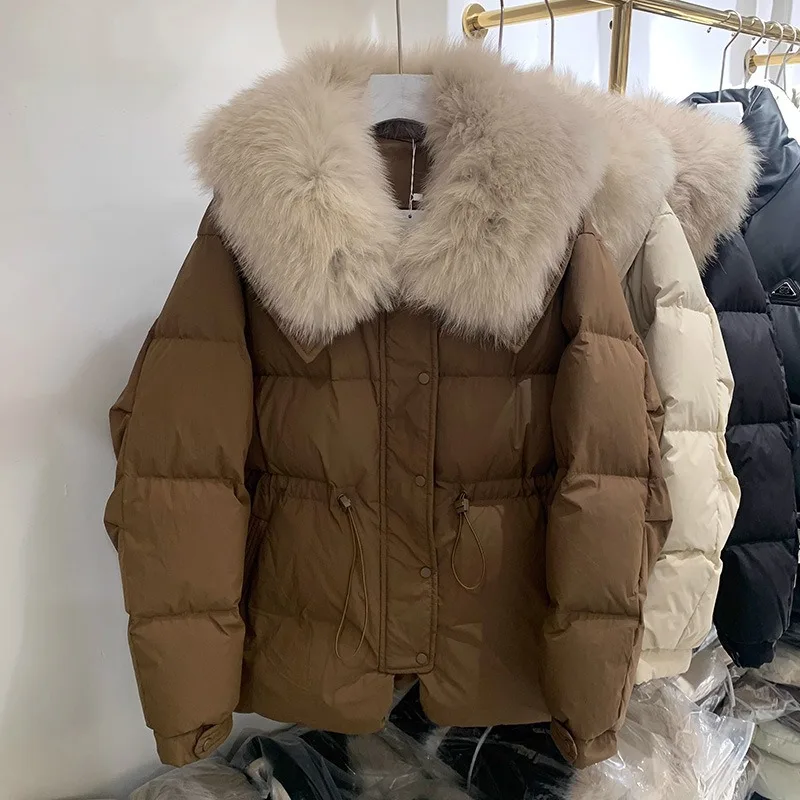 2025 Chaqueta de plumón de invierno para mujer, abrigo grueso y cálido de piel grande con cuello vuelto y plumón de pato blanco a la moda
