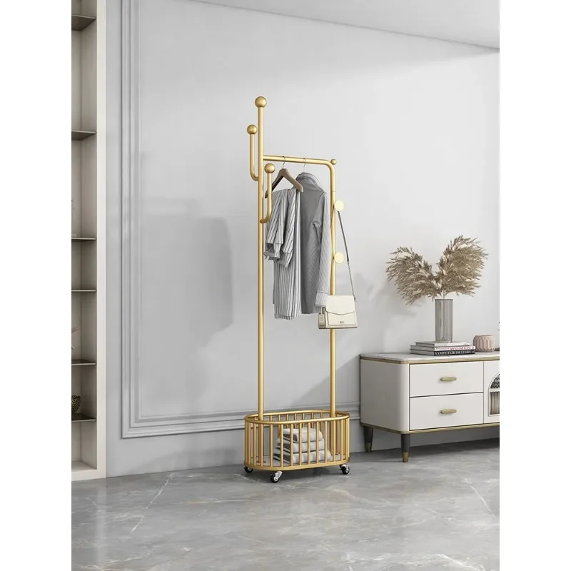 

Italian luxury clothes rack bedroom floor pulley movable net red coat rack with dirty clothes basket wrought iron clothes rack