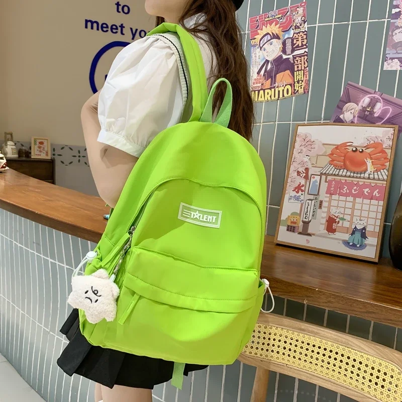 Hot Selling High-quality Solid Nylon Women's Backpack 2024 New Youth Campus Girl Backpack Cute Pendant Zipper Pocket