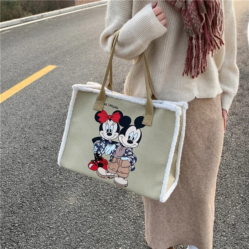 

Disney Canvas Shoulder Bag Minnie Mouse Women fashion New Autumn Winter Large Capacity Commuter Bag Cartoon Tote Bag 39x29x18cm