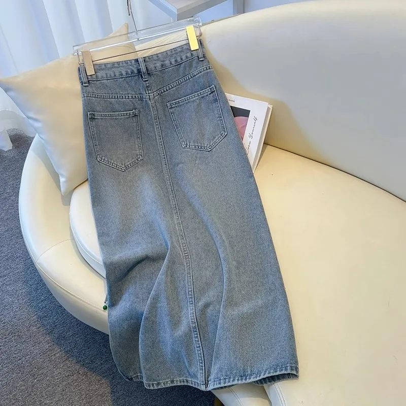 Gonna di jeans con fibbia stile cinese Donna Estate 2025 Nuova gonna a trapezio di media lunghezza divisa Temperamento Nappa Gonne slim tutte abbinate