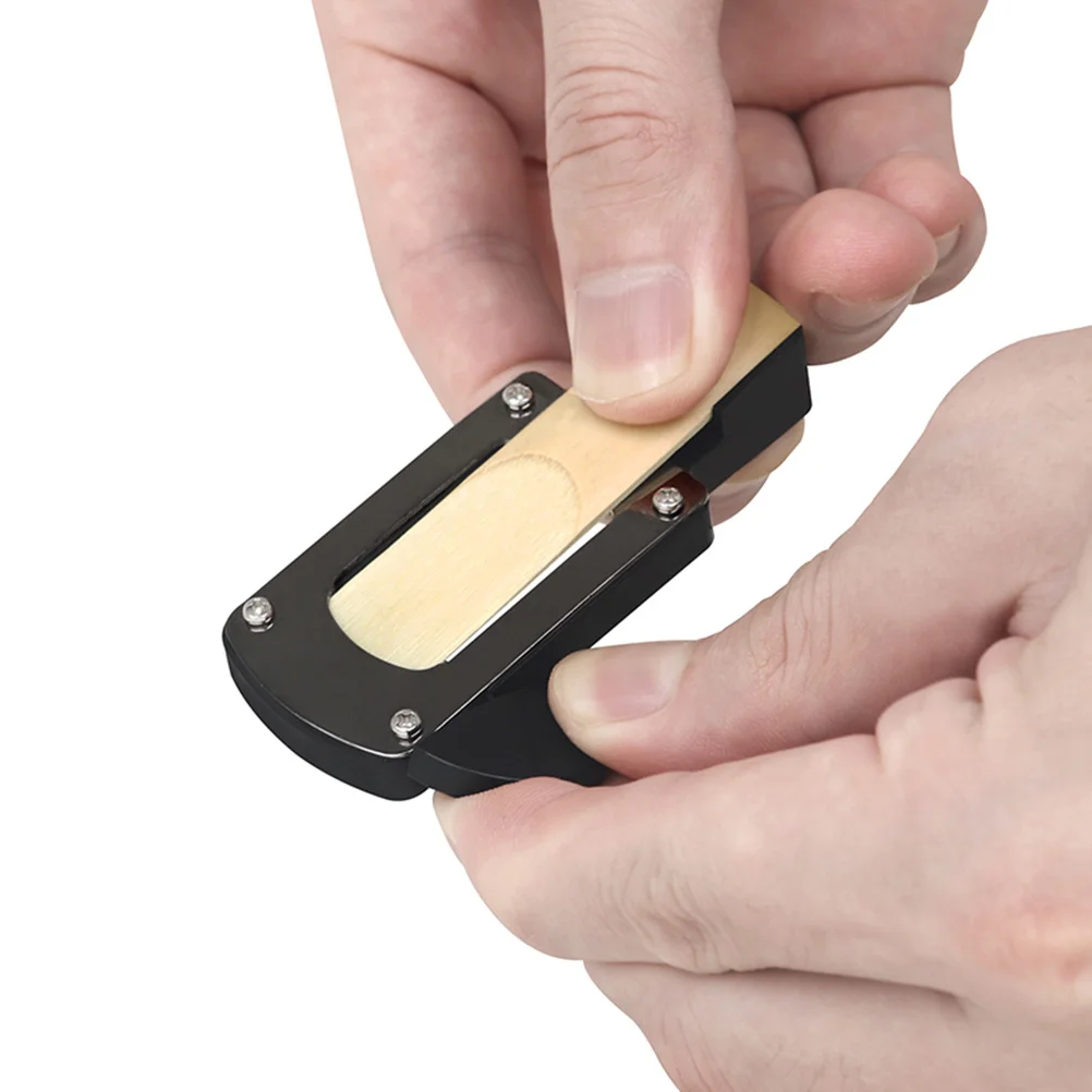 

Compact Reed Cutter for Saxophone and Clarinet Easy to Carry and Use Durable Accessory Saxophone Reed Cutter Sax Reeds Parts