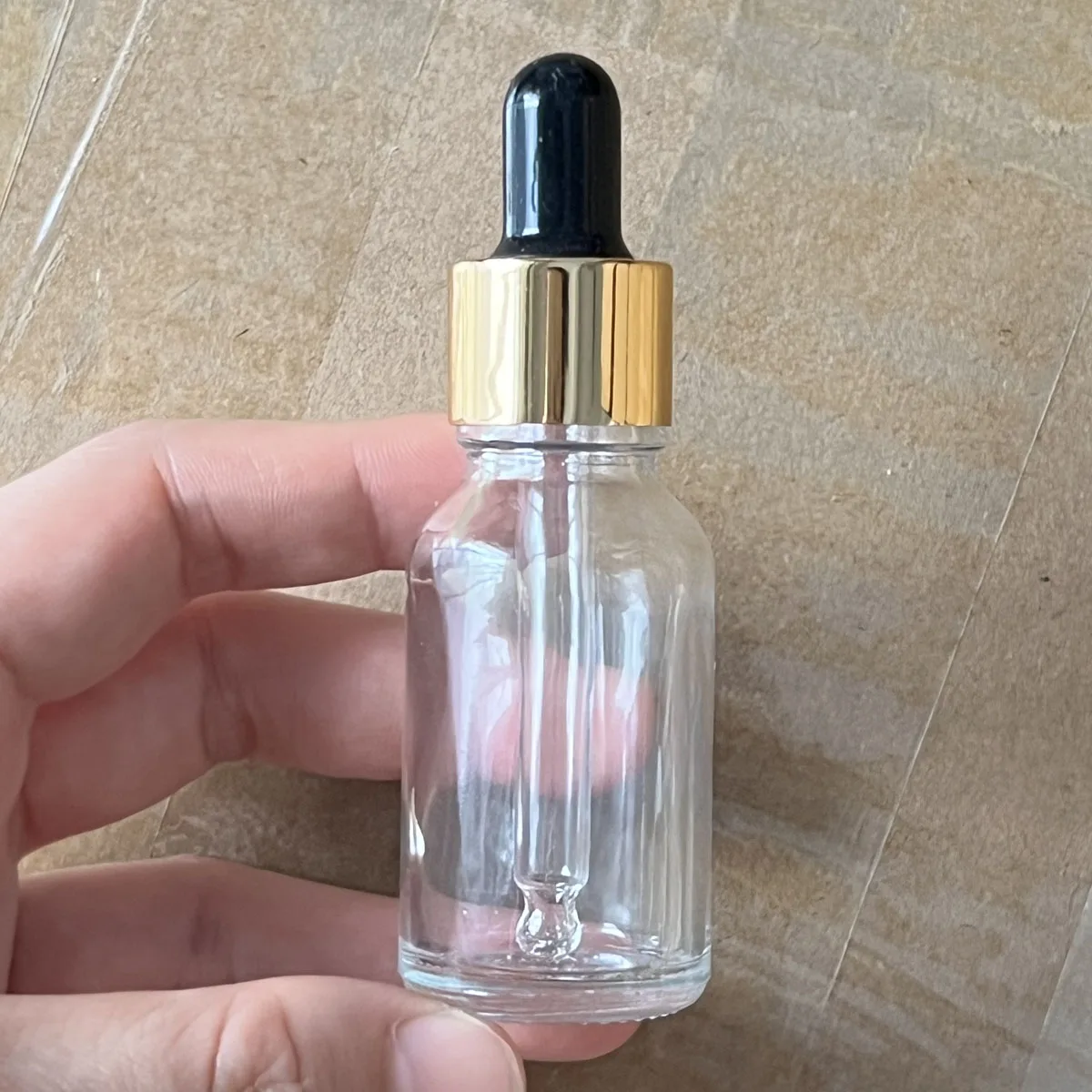 زجاجات شفافة 200 × 15 مل مع غطاء ذهبي وزجاجات قطارة زجاجية سوداء