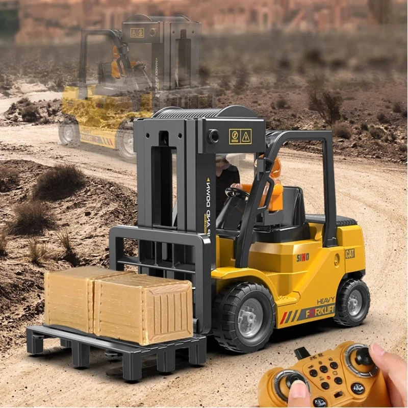 Veicolo da costruzione di simulazione elettrica del camion della gru del carrello elevatore 2.4G RC con il giocattolo dell'auto di ingegneria telecomandata dello spruzzo leggero del suono