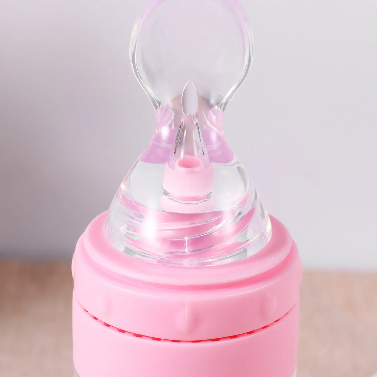Silicone Feed Squeezing Bottle with Spoon for Babies Pureed Food Cereal Rice Paste Top-Safe Material One-Hand Control Feeding