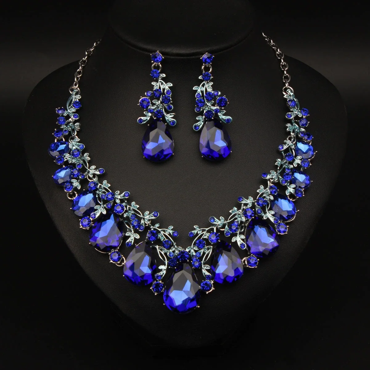 Fashionable and elegant multi-purpose gemstone necklace and earrings set for a bride's wedding dress party outfit