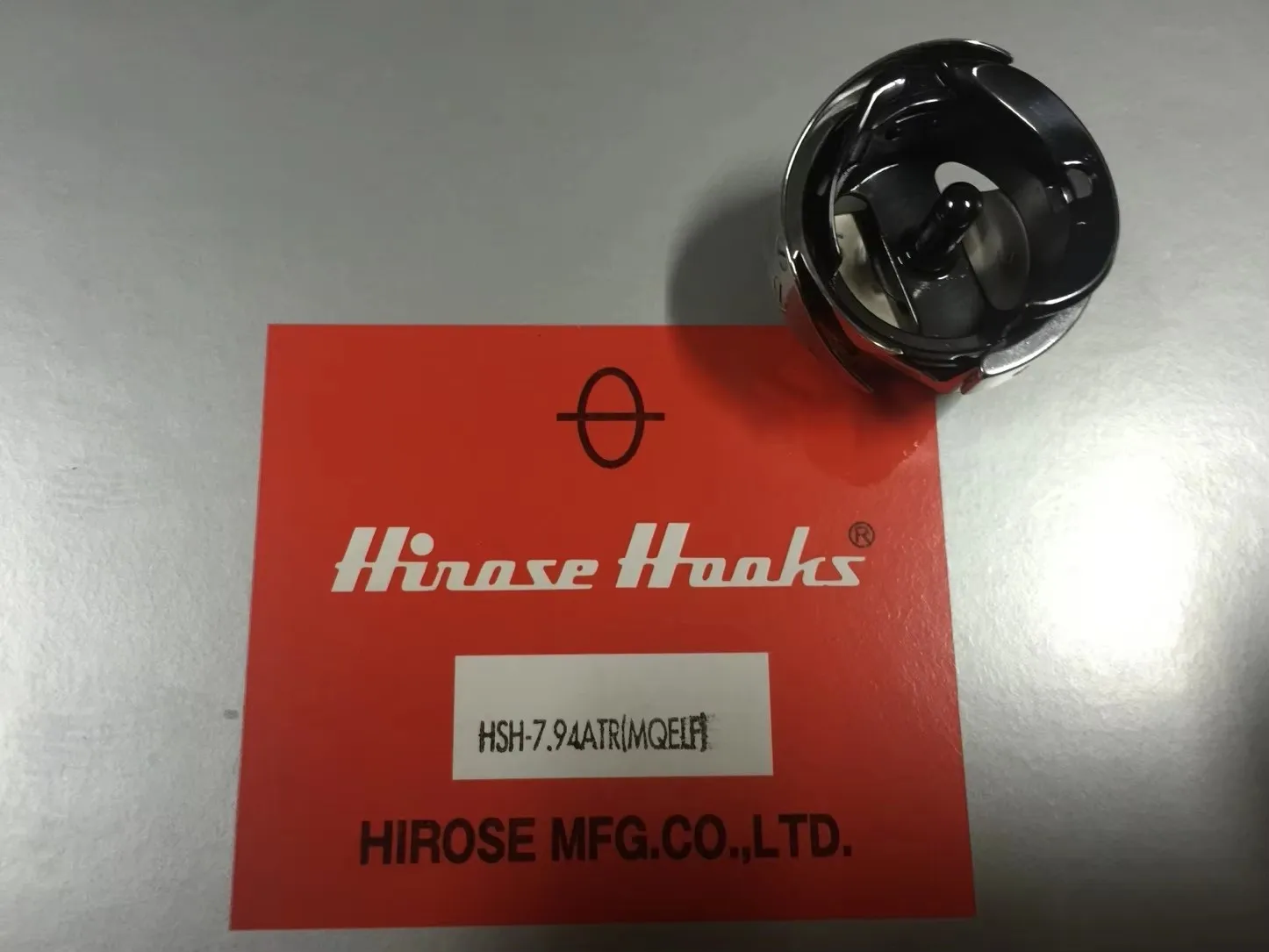 

1 шт. HSH-7.94ATR(MQELF) 100% Оригинальный японский ротационный челнок Hirose с покрытием, стандартный для вышивальных машин Tajima, Barudan, SWF, China