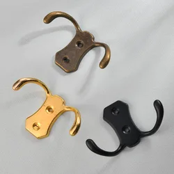 Antique European style black metal zinc alloy sheep horn small double hook fitting room clothes, hats, miscellaneous hooks