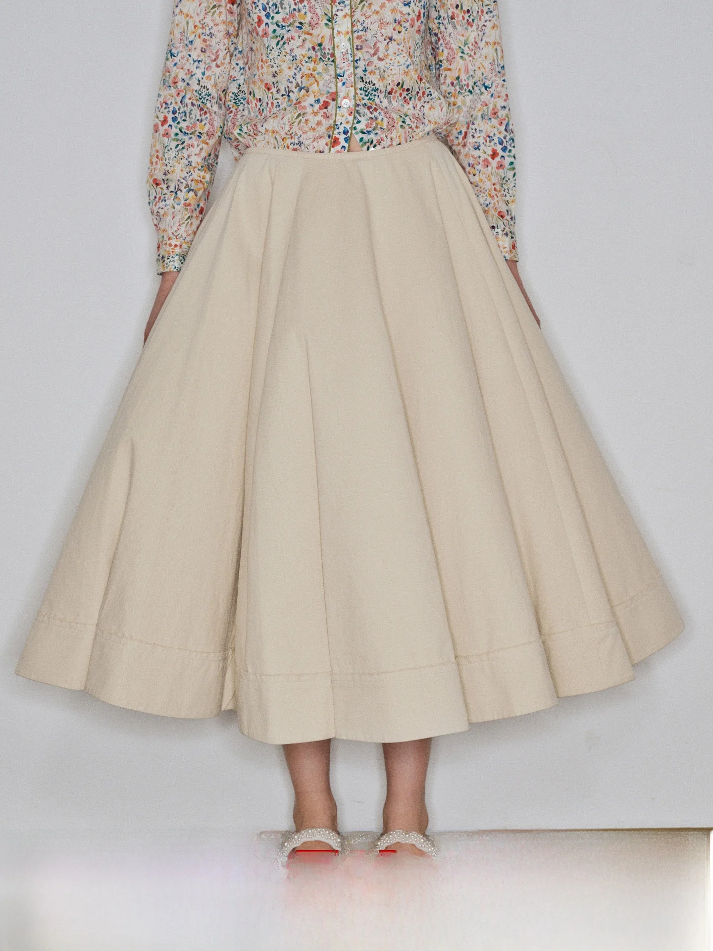 

Warm Apricot Skirt with Architectural Tailoring Large Umbrella Skirt Extra Fine 40 Tead Count Cotton Diagonal Pattern High ...