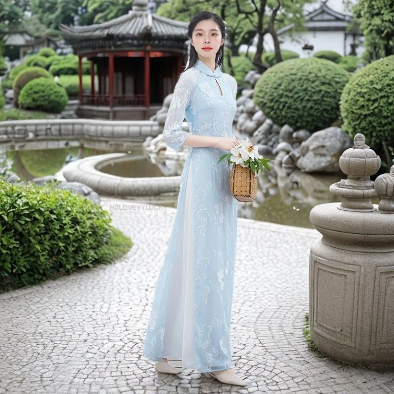 ملابس السنة الصينية التقليدية الجديدة للمرأة فستان شيونغسام التطريز خمر الإناث تشيباو الشرقية فيتنام أوداي فستان