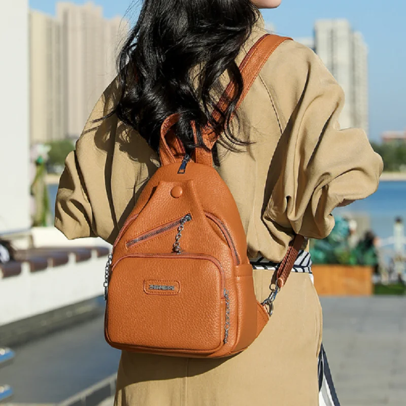 

2026 New Women's Korean Fashion Soft Leather Travel Small Backpacks High Capacity Crossbody Shoulder Bags Chest Bag