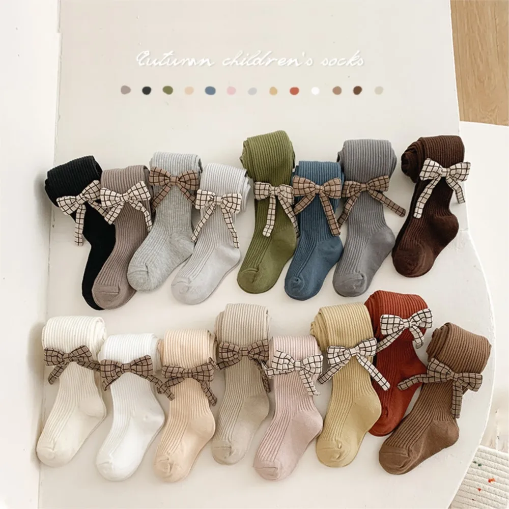 Girls leggings spring and autumn thin Korean bow baby solid color children's pantyhose wholesale leggings