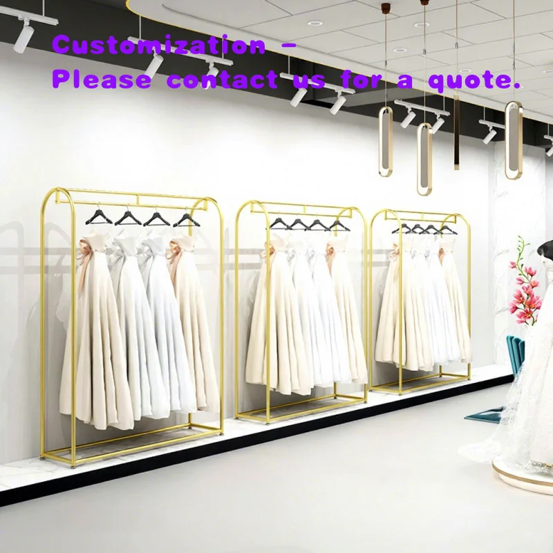 

Стойка-вешалка для одежды на заказ: золотистая железная напольная стойка для демонстрации платьев, в том числе для свадебных и фотостудийных сессий, а также для демонстрации одежды в магазинах.