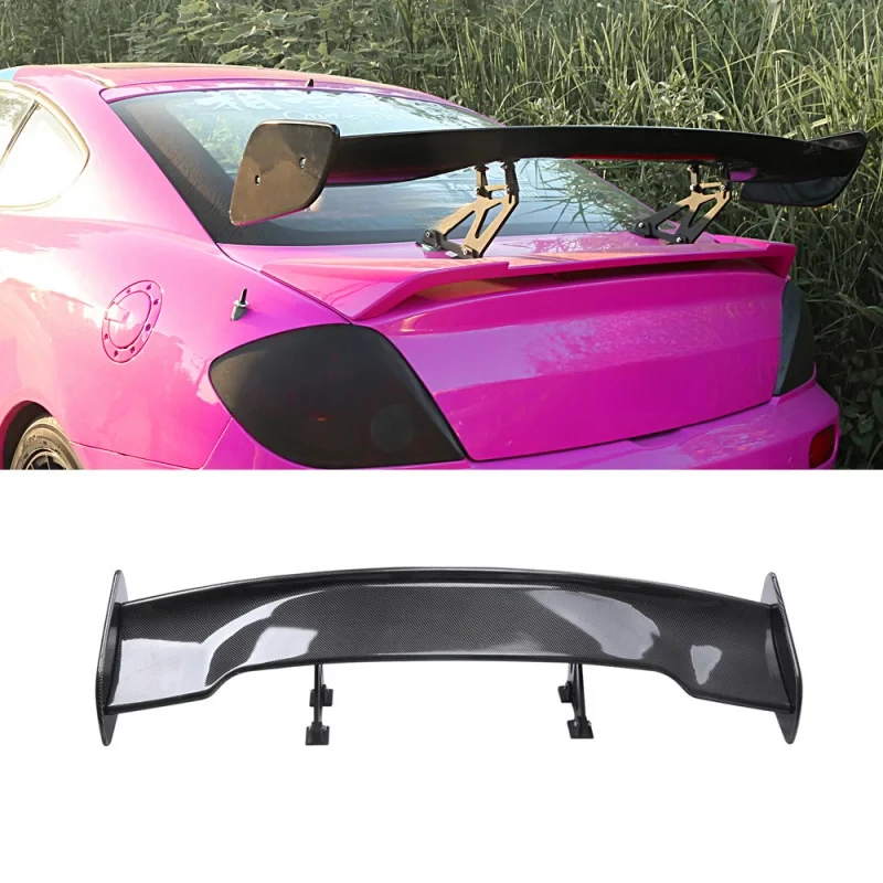 

rear exterior trim, spoiler, GT carbon fiber rear wing, racing-inspired car styling.