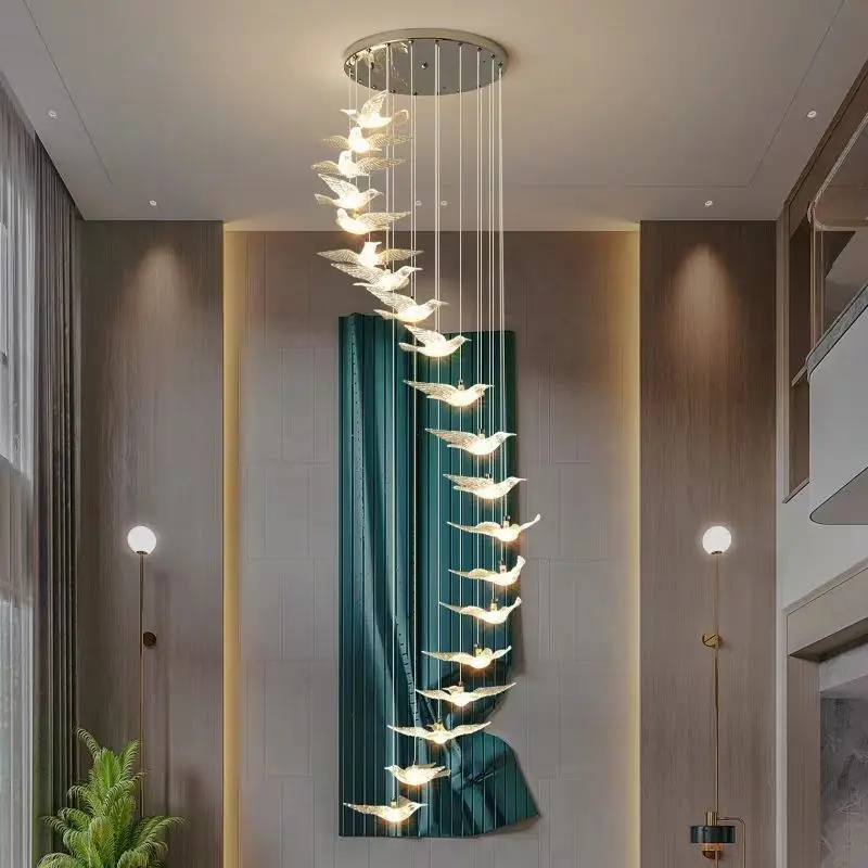 

The stairwell is modern, simple and atmospheric, with an adjustable and rotating duplex chandelier