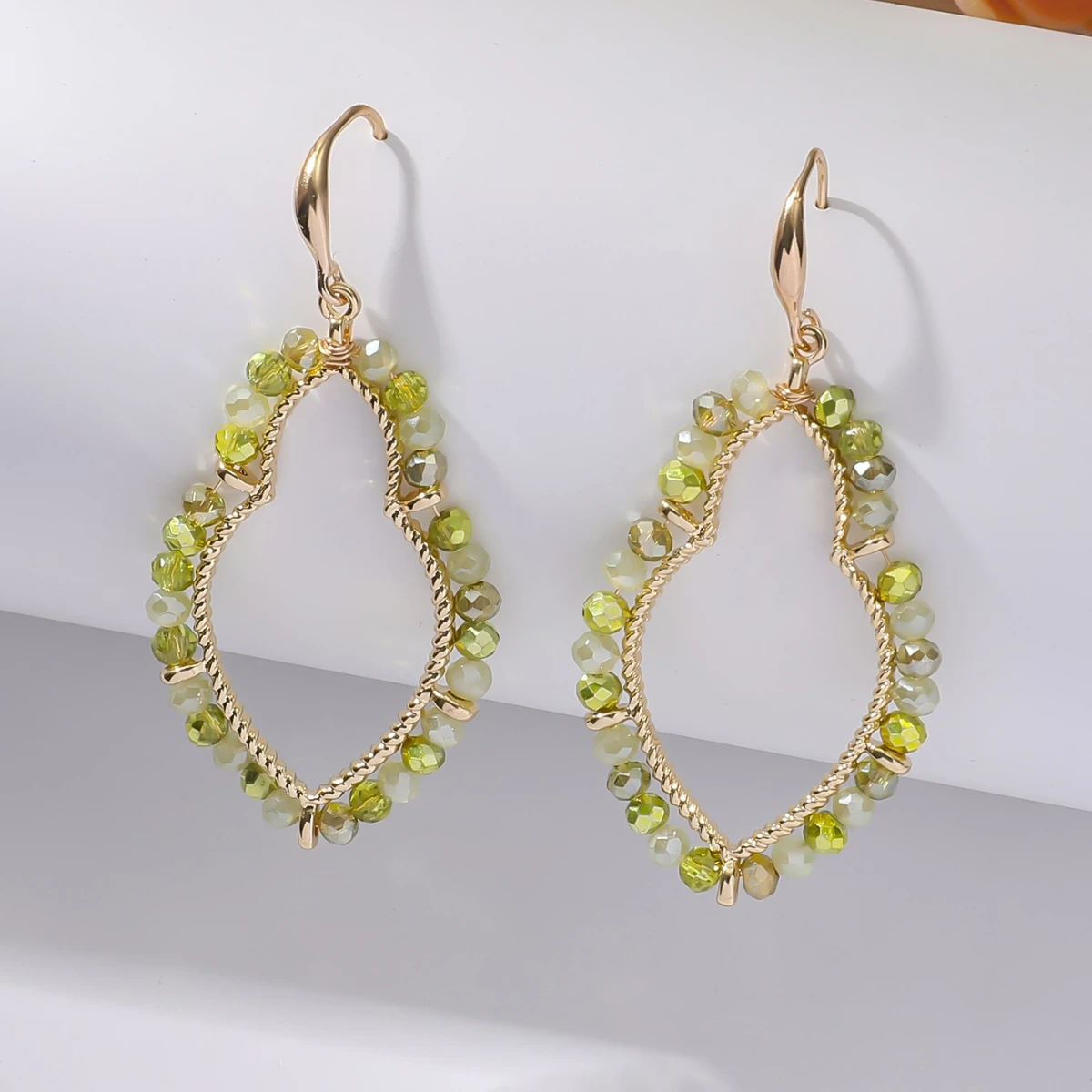 Bohemian-inspired handmade beaded geometric gourd earrings with versatile charm—perfect for women's everyday wear.