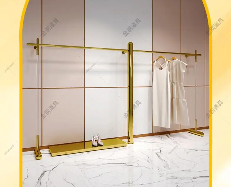 

Clothing store display shelf wall hanging floor stainless steel titanium gold hanging clothes shelf women's store display shelve