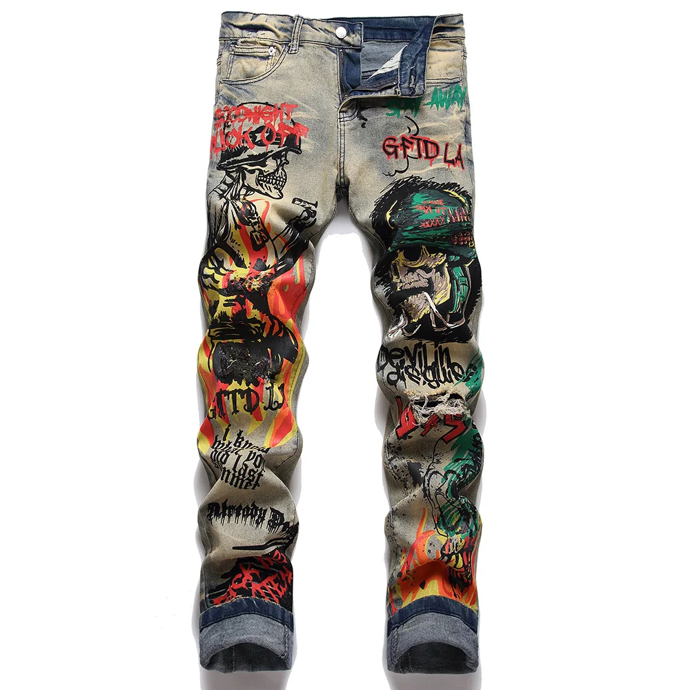 Jeans in Denim elasticizzato da uomo con stampa Streetwear personaggio teschio dipinto a fiamma pantaloni Vintage bottoni pantaloni sottili strappati