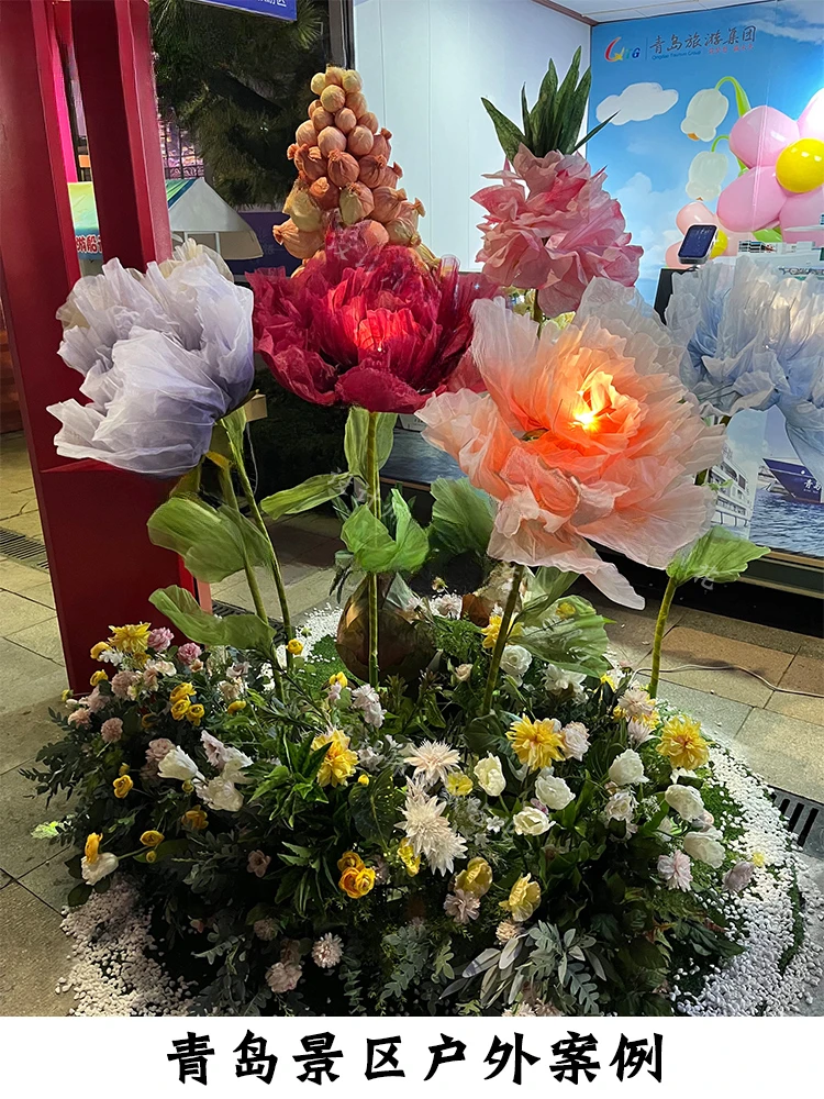 

Automatic opening and closing of manual paper art flowers in large shopping malls by electric machinery