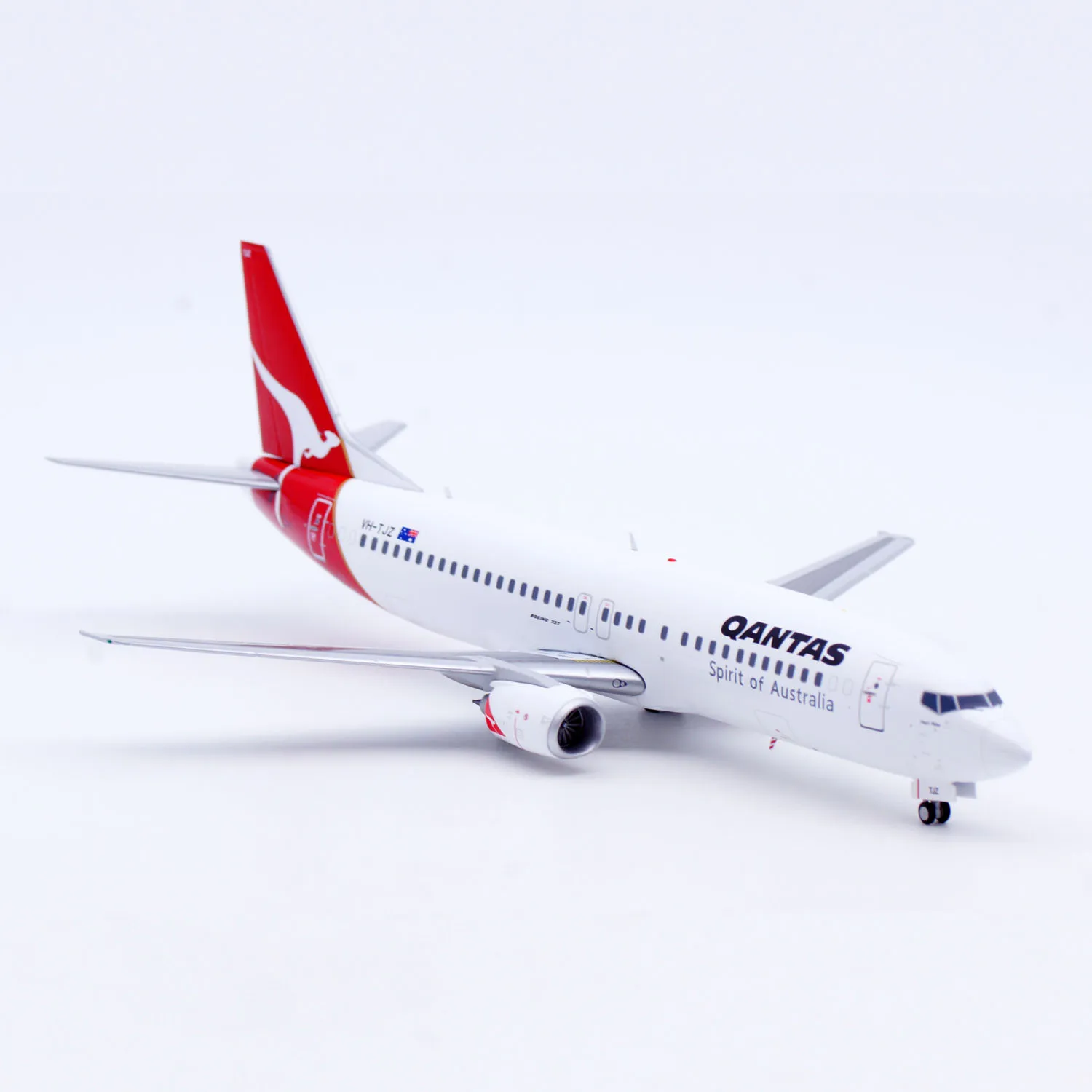 XX20393 سبيكة تحصيل طائرة هدية JC أجنحة 1:200 Qantas الخطوط الجوية بوينغ B737-400 دييكاست نموذج طائرة VH-TJZ مع حامل