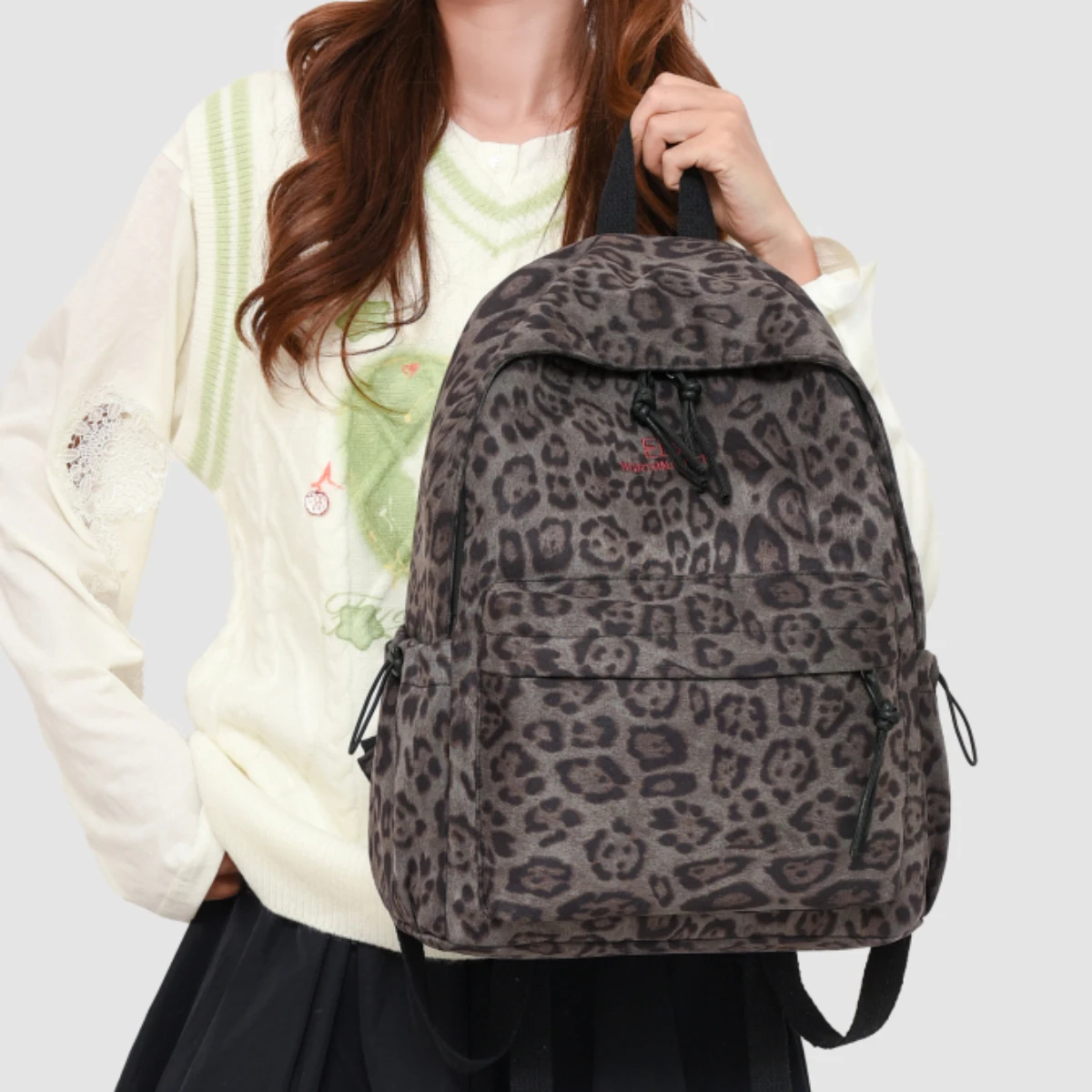 High-End Japanese Niche Backpack Leopard Print School Bag for Female College Students Large Capacity Lightweight Canvas Backpack for Middle and High School Students Commuting to Work