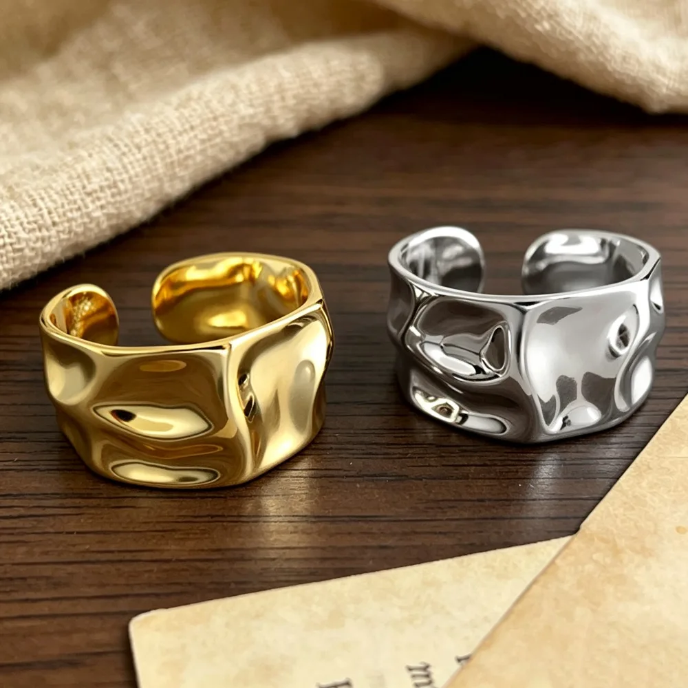 Irregular opening golden ring, adjustable size, with a wide design of concave and convex surfaces for women's rings.