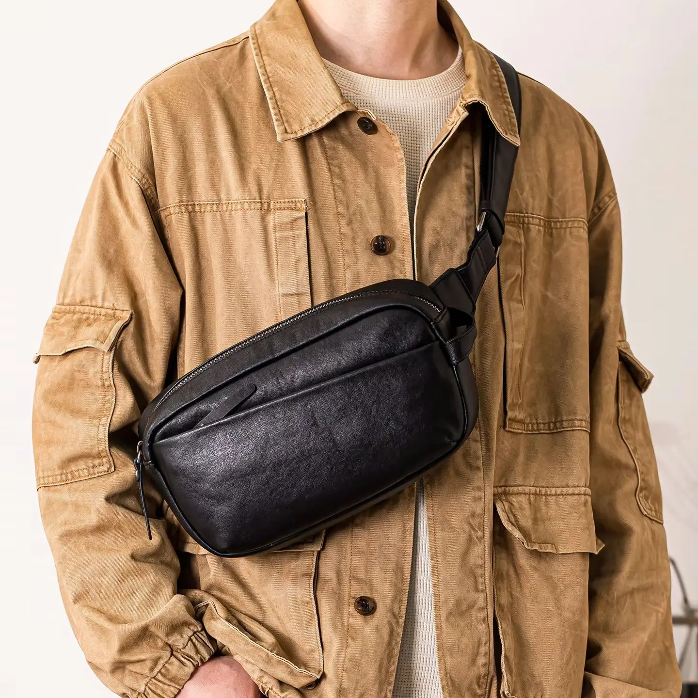 PNDME casual first layer cowhide men multifunctional chest bag outdoor travel luxury genuine leather sports black crossbody bag