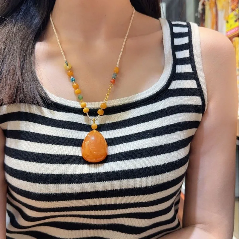 Natural drop full of honey date-red old flower wax hand-woven rope beeswax pendant